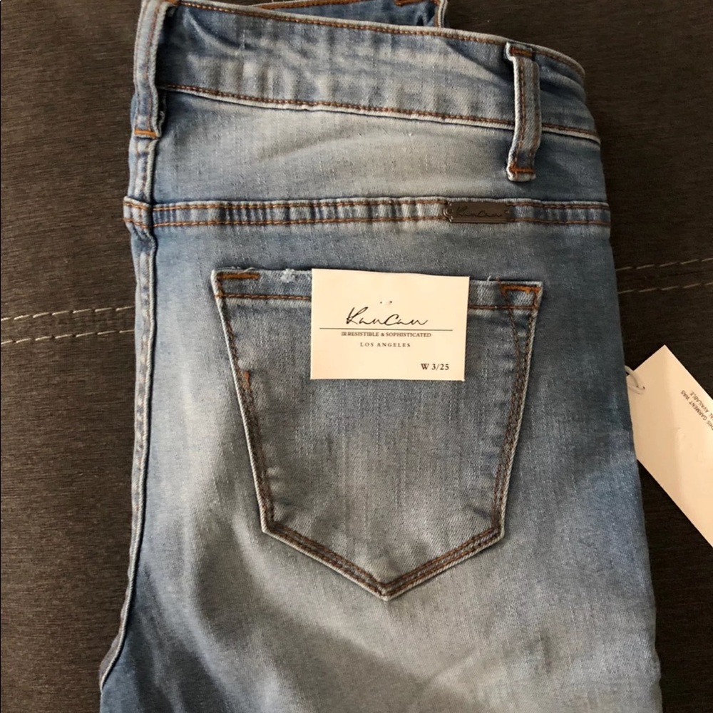 Frayed distressed jeans